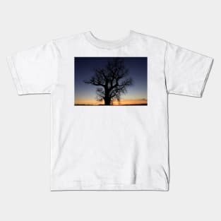 Kansas colorful Sunset with a Tree Silhouette out in the country Kids T-Shirt